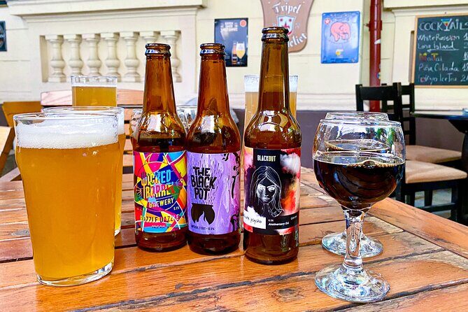 Bucharest: Craft Beer Tour with Traditional Meal Included - Food and beer pairing: covrig, then mici, then pints